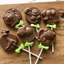 A set of 6 cute jungle themed chocolate lollipops- giraffe, tiger ,lion , hippo, elephant and turtle